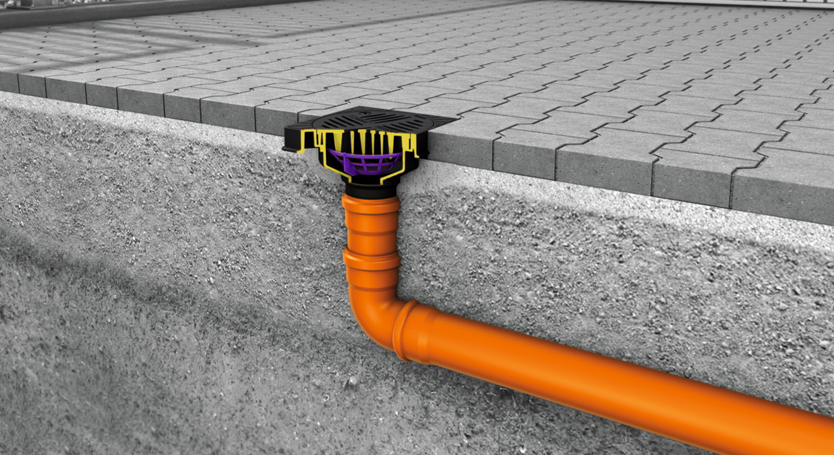 Seitenschnitt eines in Pflastersteinauffahrt integrierten Ablaufrohrs für Entwässerungssysteme.